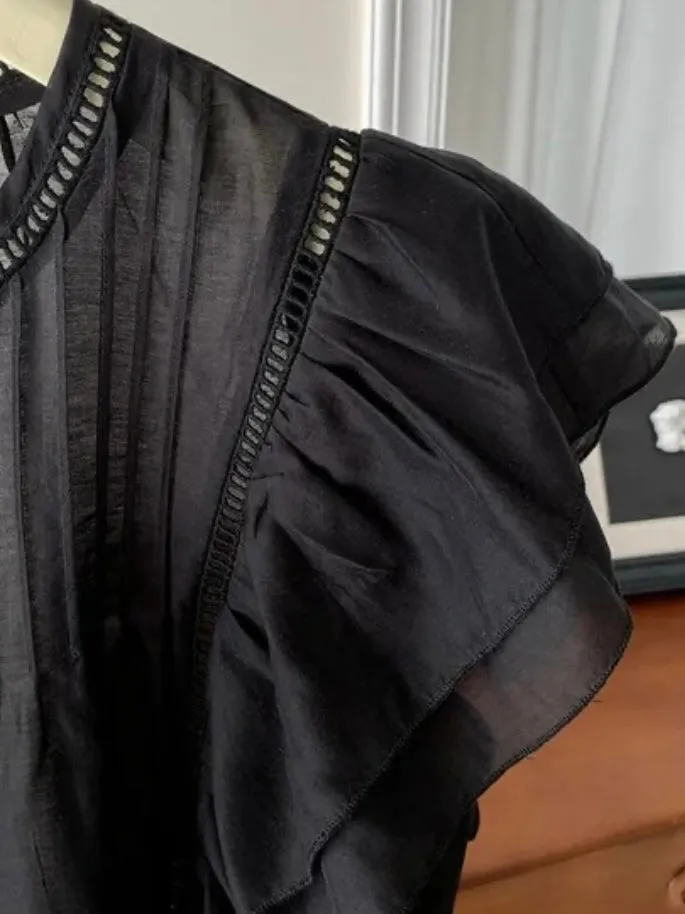 Black ruffled sleeveless top
